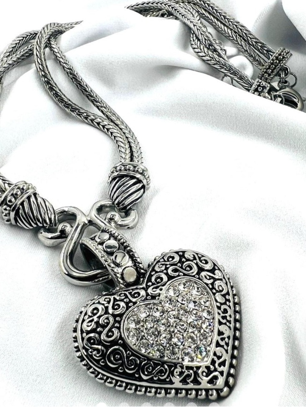Immaculate Lia Sophia "Love Dust" Cut Crystal Heart Silver Tone
Necklace.